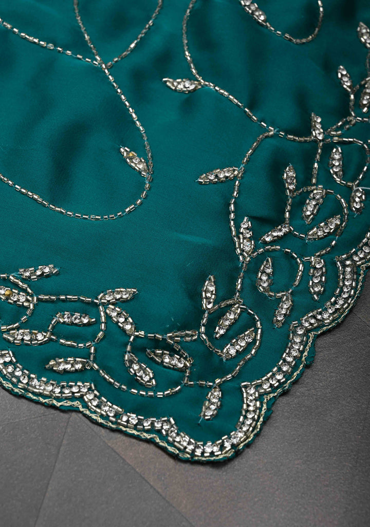 Teal Blue Full Jaal Cutdana embellished saree in Satin Georgette