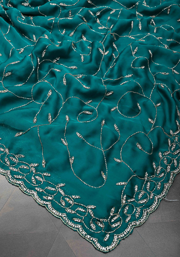 Teal Blue Full Jaal Cutdana embellished saree in Satin Georgette