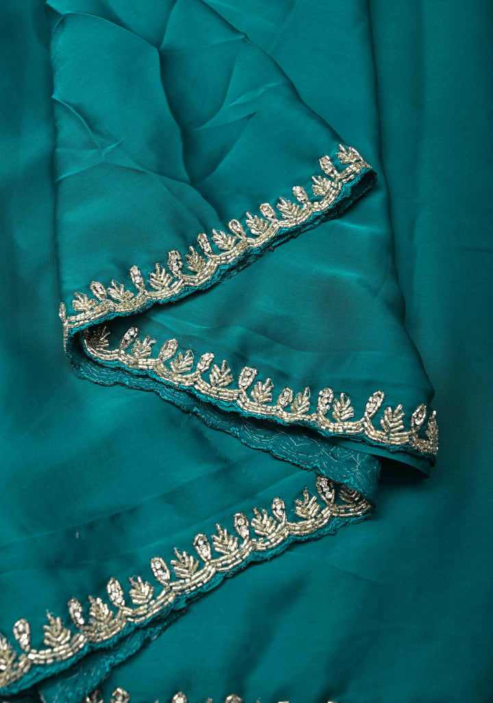 Teal  Satin Geoergette Saree with minimal cutdana borders