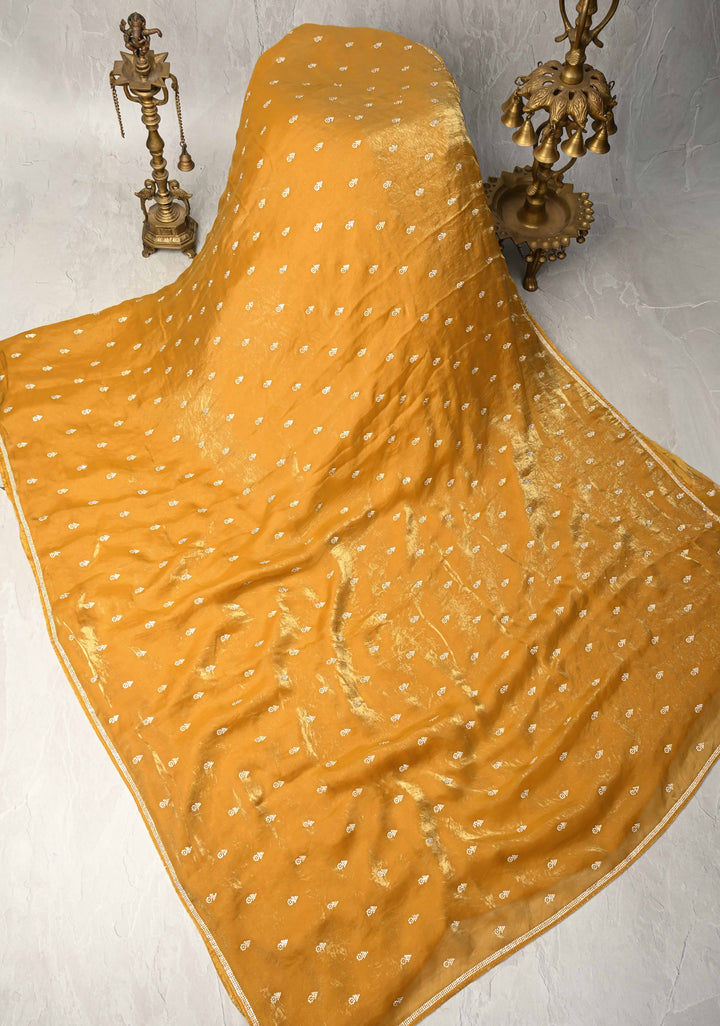 Mustard Yellow Shimmer Georgette Saree with Stone Embellishments and Minimal Border