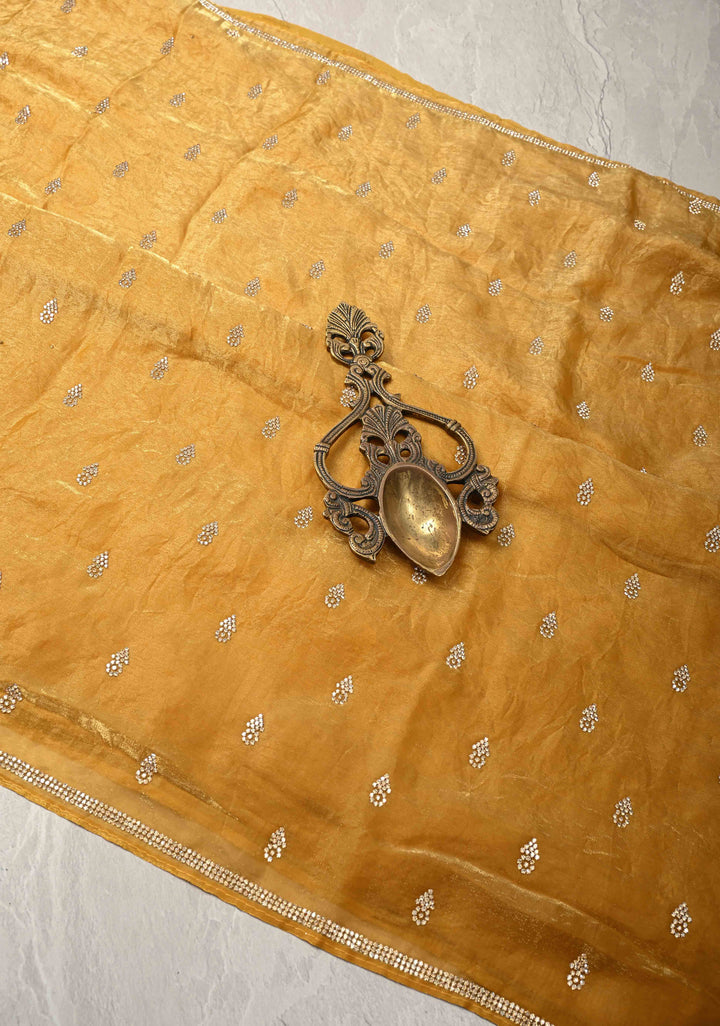 Mustard Yellow Shimmer Georgette Saree with Stone Embellishments and Minimal Border