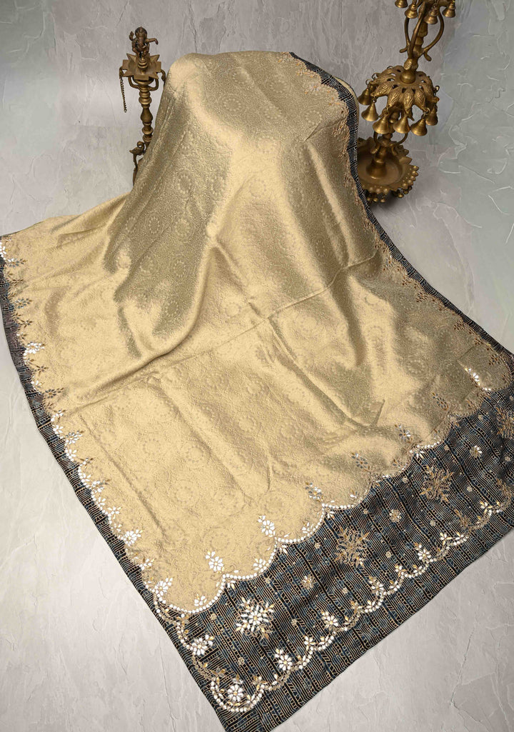 Beige Vegan Viscose Tissue Brocade Saree with Ajrakh Applique and Gota Patti work on Scallop Border