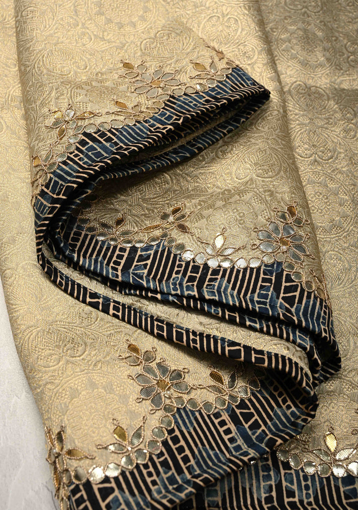 Beige Vegan Viscose Tissue Brocade Saree with Ajrakh Applique and Gota Patti work on Scallop Border