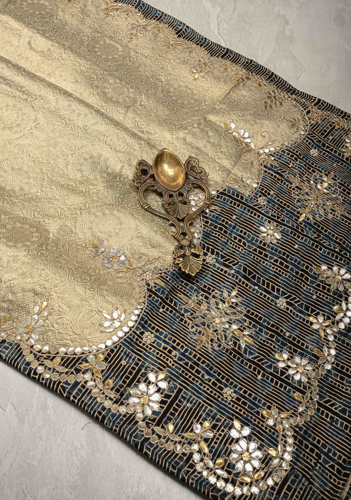 Beige Vegan Viscose Tissue Brocade Saree with Ajrakh Applique and Gota Patti work on Scallop Border