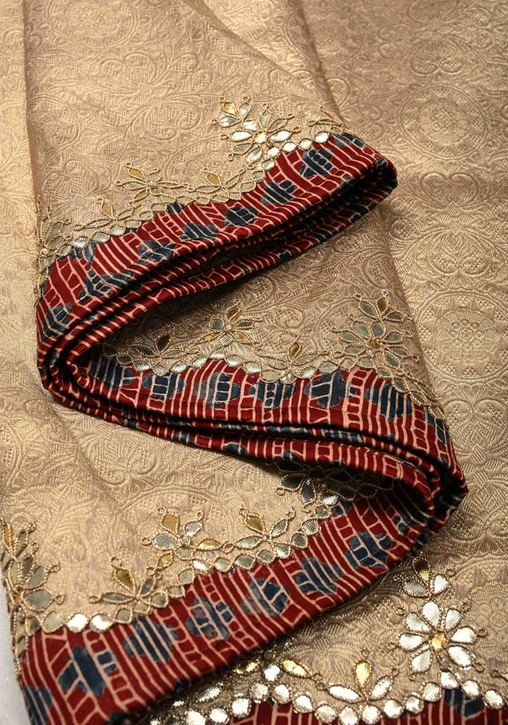 Dusty Standstone Vegan Viscose Silk Tissue Brocade Saree with Ajrakh Applique and Gota Patti work on Scallop Border