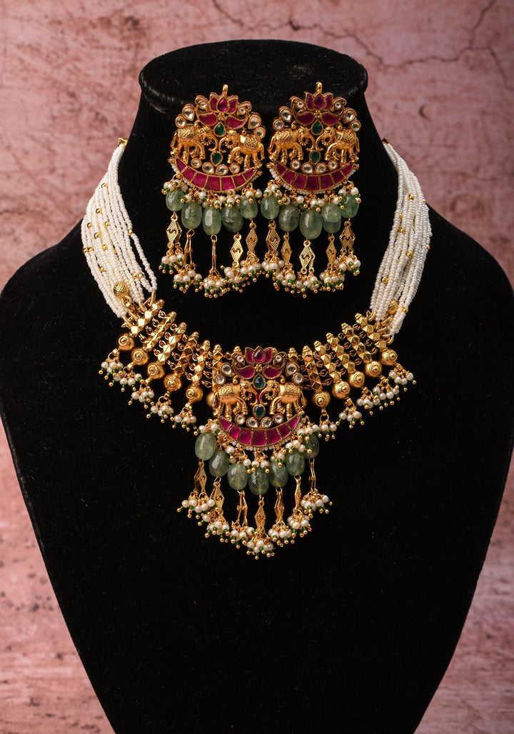 Antique Gold Tone White beads Multistrand Gold Tone Flexible Twin elephant design Simple Necklace Set with sage green dangling beads