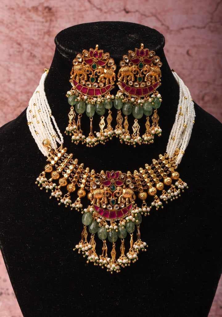 Antique Gold Tone White beads Multistrand Gold Tone Flexible Twin elephant design Simple Necklace Set with sage green dangling beads