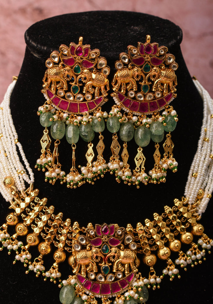 Antique Gold Tone White beads Multistrand Gold Tone Flexible Twin elephant design Simple Necklace Set with sage green dangling beads