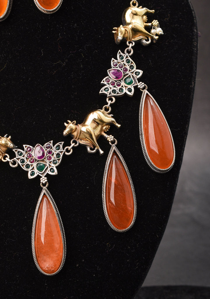 Fusion Dual Tone Jewelry with Pichwai Cow Units and burnt orange Stones | Shobitam Jewelry