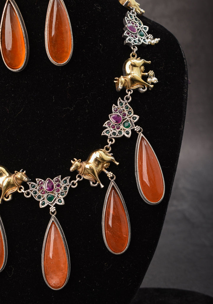 Fusion Dual Tone Jewelry with Pichwai Cow Units and burnt orange Stones | Shobitam Jewelry
