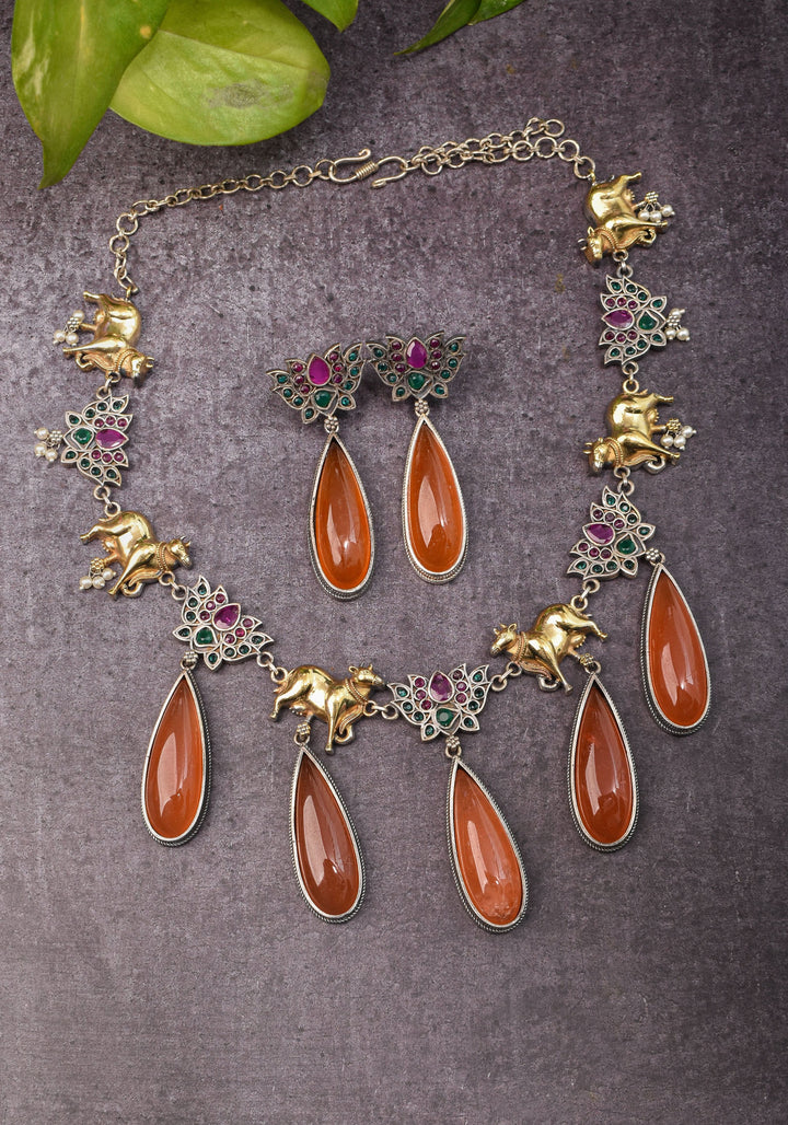 Fusion Dual Tone Jewelry with Pichwai Cow Units and burnt orange Stones | Shobitam Jewelry