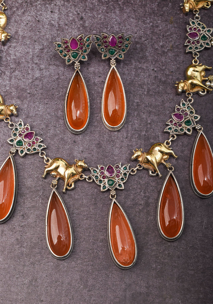 Fusion Dual Tone Jewelry with Pichwai Cow Units and burnt orange Stones | Shobitam Jewelry