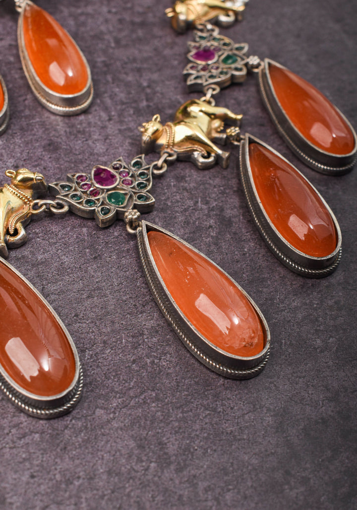 Fusion Dual Tone Jewelry with Pichwai Cow Units and burnt orange Stones | Shobitam Jewelry