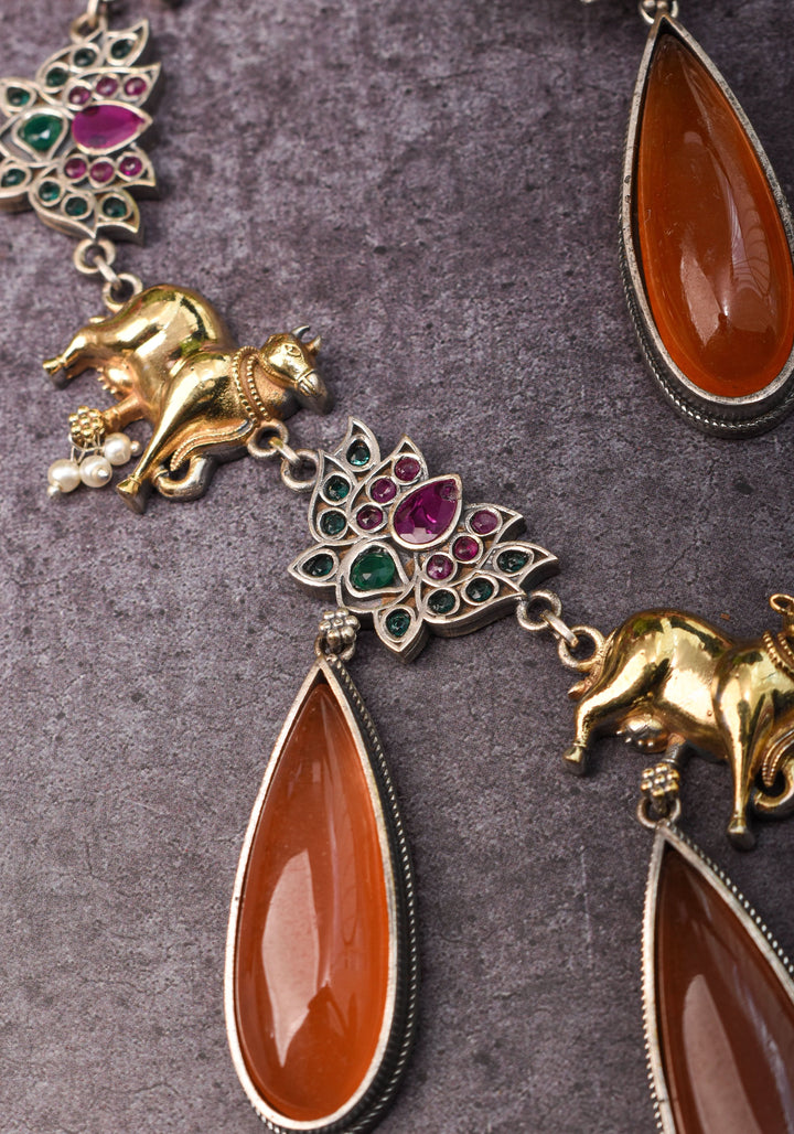 Fusion Dual Tone Jewelry with Pichwai Cow Units and burnt orange Stones | Shobitam Jewelry