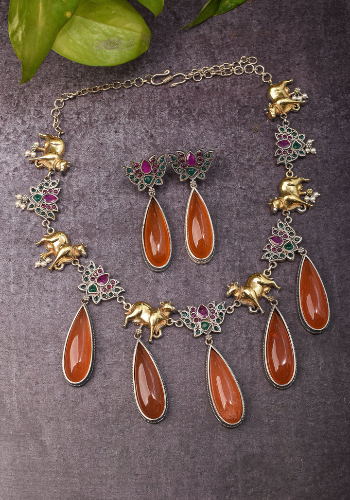Fusion Dual Tone Jewelry with Pichwai Cow Units and burnt orange Stones | Shobitam Jewelry