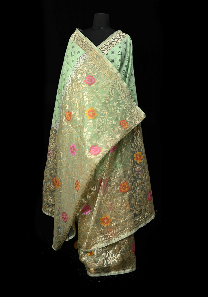 Pista Green Handloom Banarasi Meenakari Raw Silk by  Net Saree Featuring Jamdhani Inspired Design