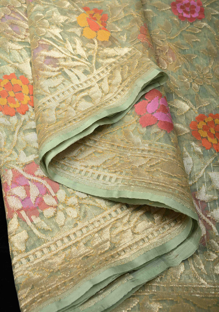 Pista Green Handloom Banarasi Meenakari Raw Silk by  Net Saree Featuring Jamdhani Inspired Design