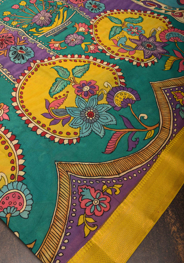 Floral and Peacock Theme : Purple Authentic Pen kalamkari on Mangalagiri Silk Saree with zari border