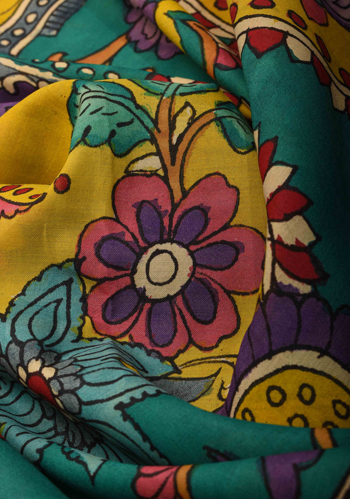 Floral and Peacock Theme : Purple Authentic Pen kalamkari on Mangalagiri Silk Saree with zari border