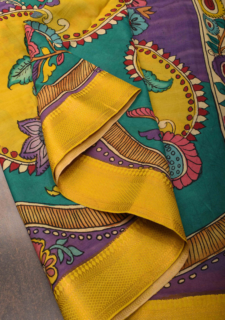 Floral and Peacock Theme : Purple Authentic Pen kalamkari on Mangalagiri Silk Saree with zari border