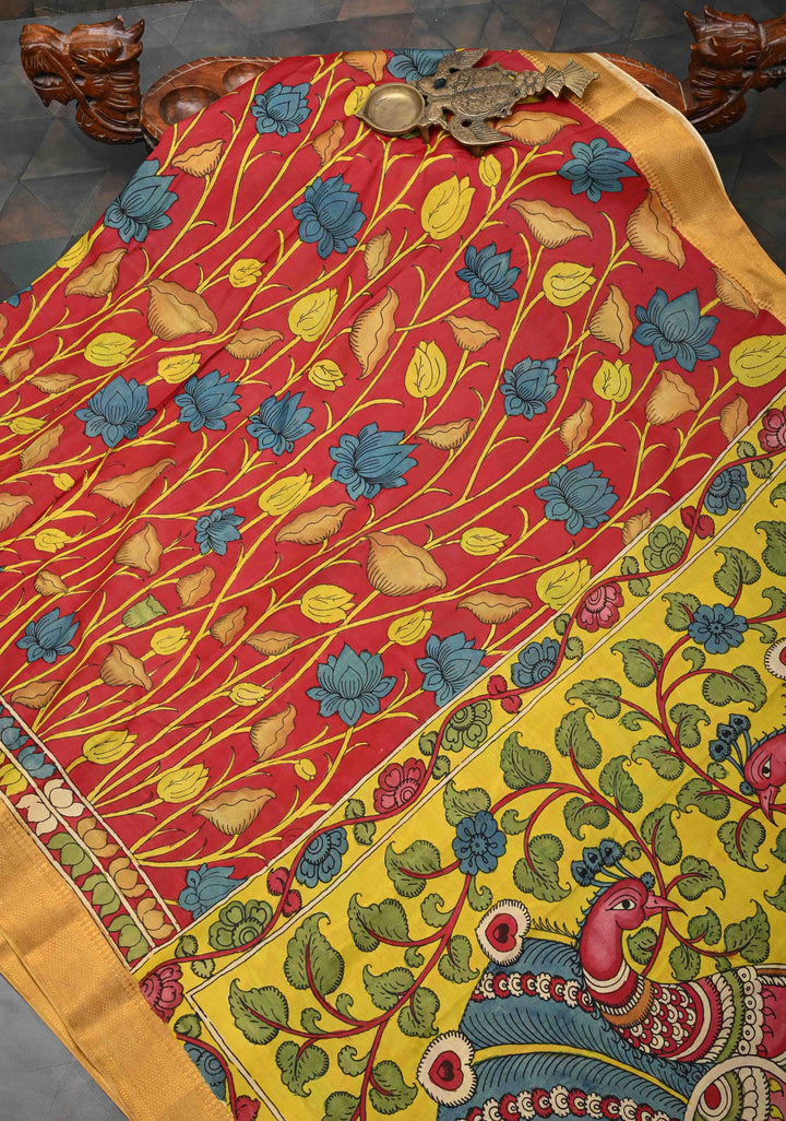 Lotus and Peacock Theme : Maroon Authentic Pen kalamkari on Mangalagiri Silk Saree with Zari Border
