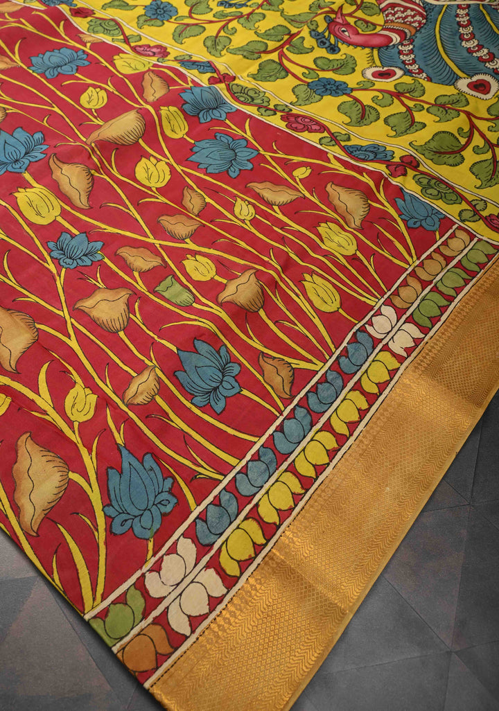 Lotus and Peacock Theme : Maroon Authentic Pen kalamkari on Mangalagiri Silk Saree with Zari Border
