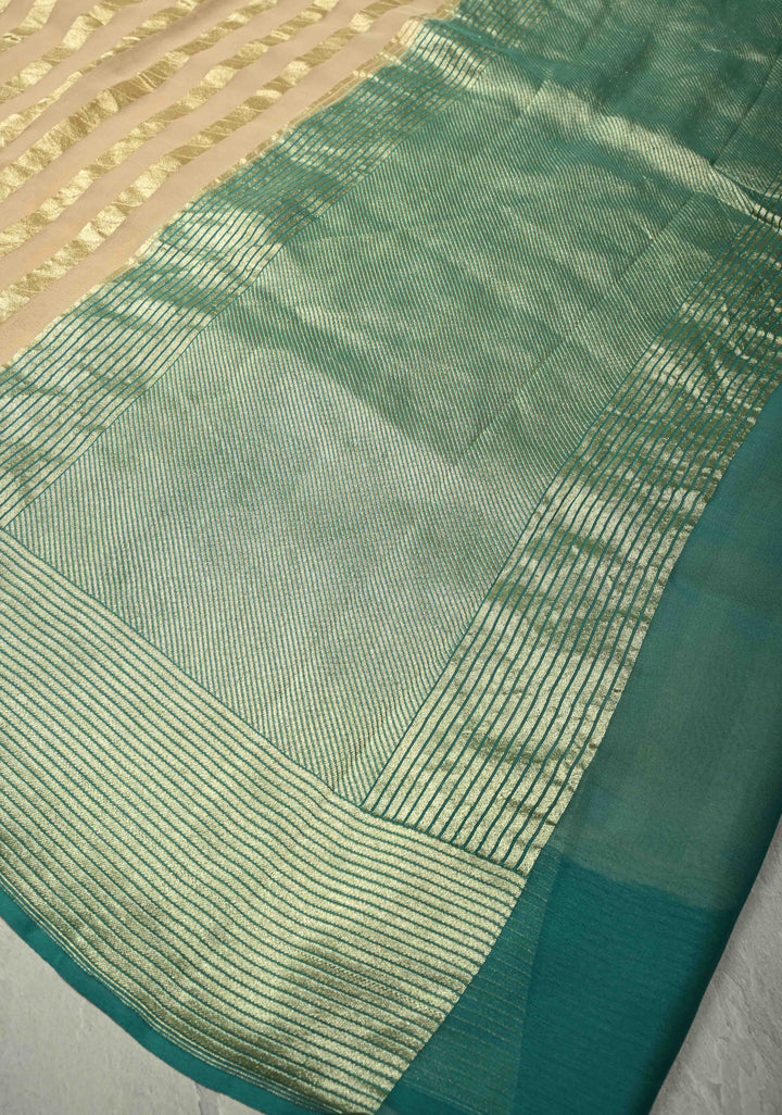 Off white vertical stripes on banarasi georgette Silk saree with turquoise zari border and Pallu | SILK MARK CERTIFIED