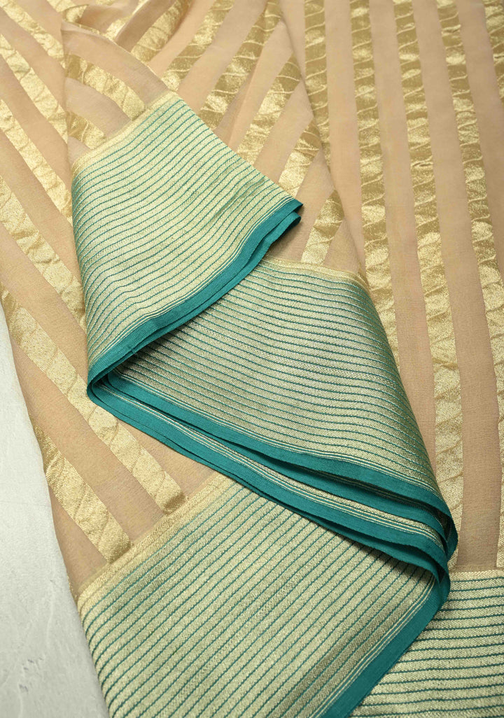 Off white vertical stripes on banarasi georgette Silk saree with turquoise zari border and Pallu | SILK MARK CERTIFIED