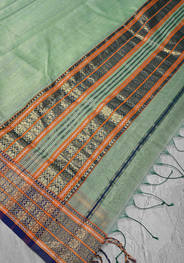 Mint Green Handwoven Maheshwari Silk Cotton Saree with Muted Stripes And Zari Border