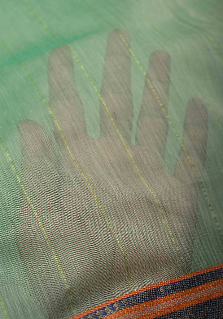 Mint Green Handwoven Maheshwari Silk Cotton Saree with Muted Stripes And Zari Border