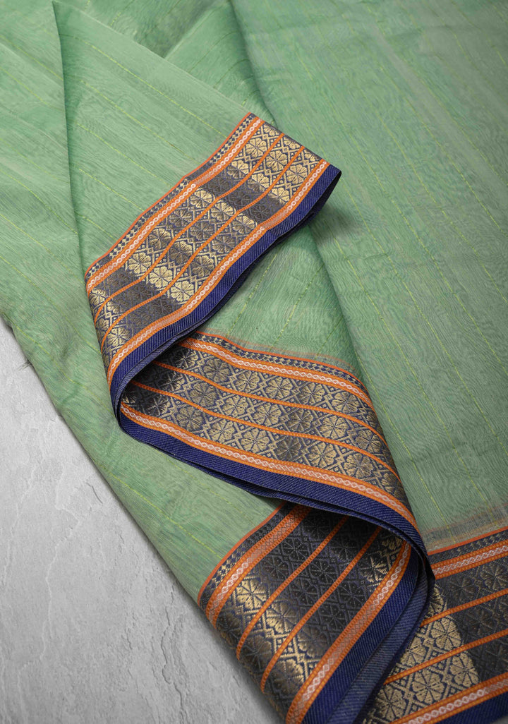 Mint Green Handwoven Maheshwari Silk Cotton Saree with Muted Stripes And Zari Border