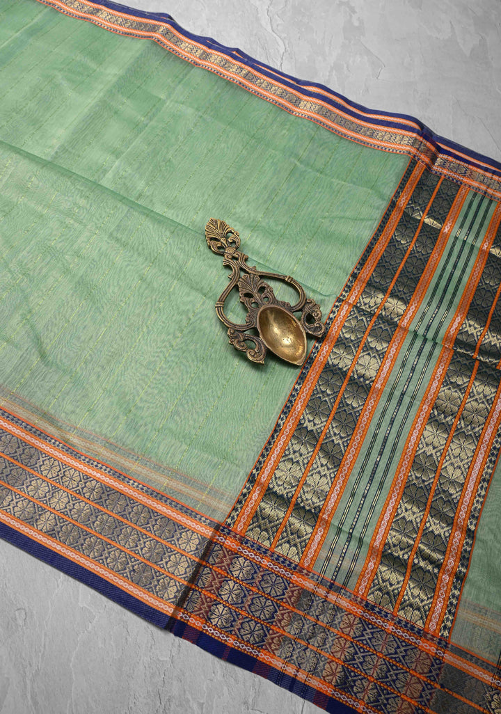 Mint Green Handwoven Maheshwari Silk Cotton Saree with Muted Stripes And Zari Border