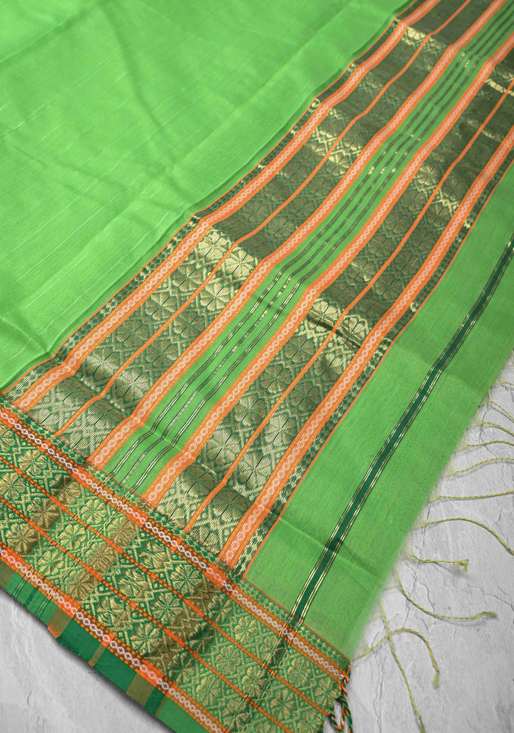 Parrot Green Handwoven Maheshwari Silk Cotton Saree with Muted Stripes and Zari Borders