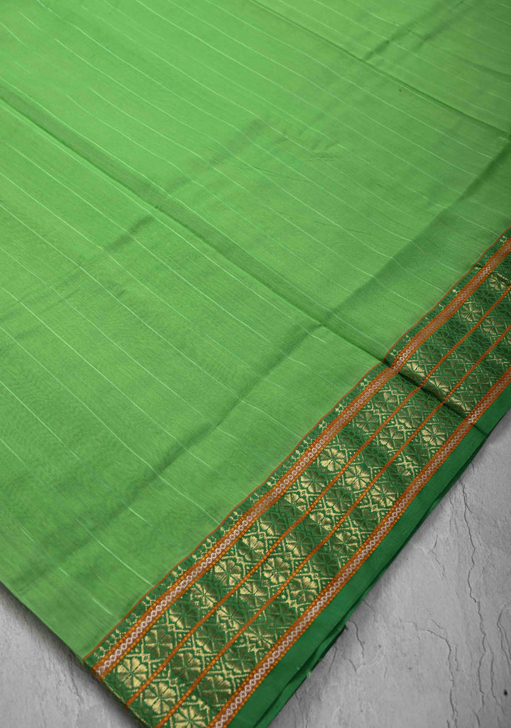 Parrot Green Handwoven Maheshwari Silk Cotton Saree with Muted Stripes and Zari Borders