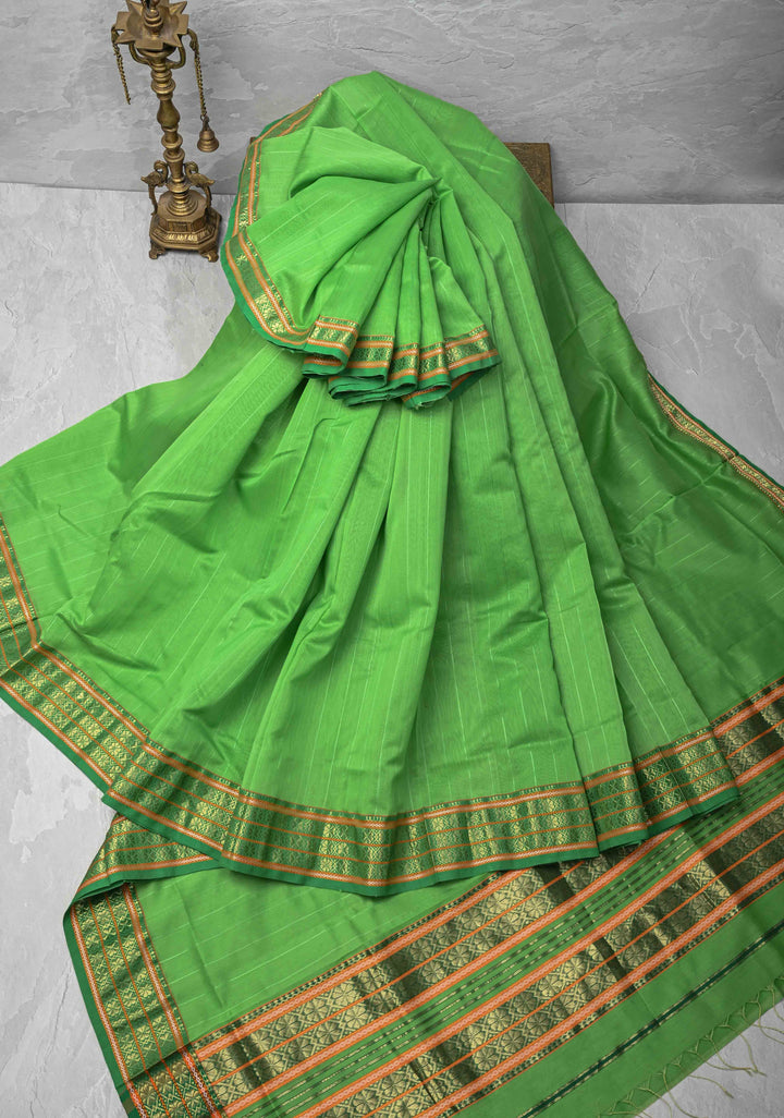 Parrot Green Handwoven Maheshwari Silk Cotton Saree with Muted Stripes and Zari Borders