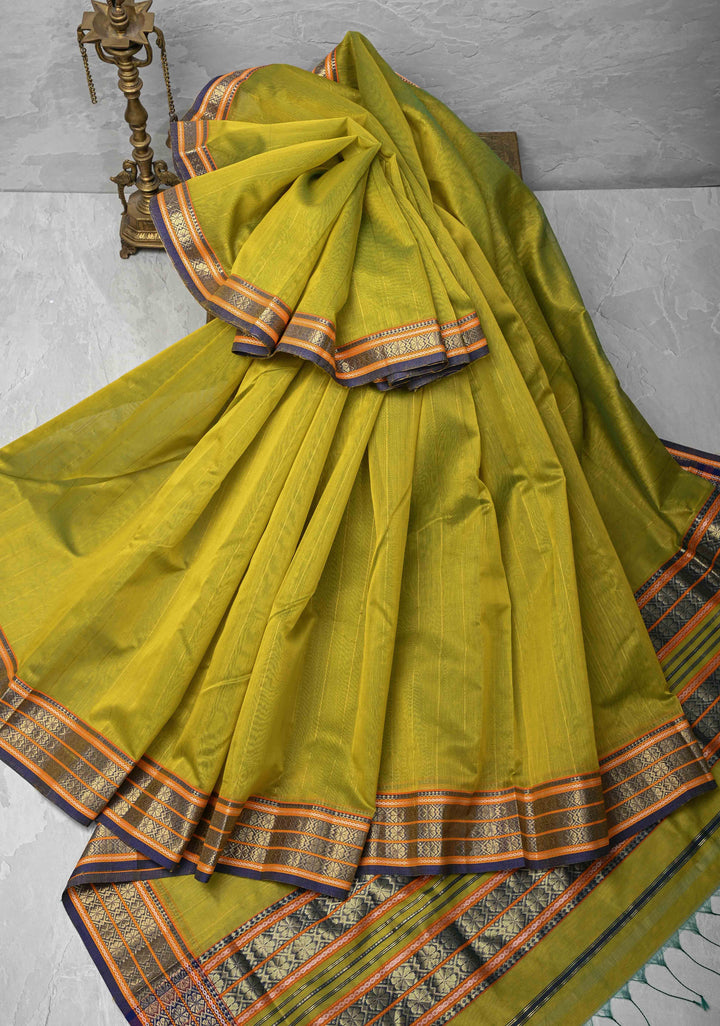 Lime Green Handwoven Maheshwari Silk Cotton Saree with Muted Stripes and Zari Borders