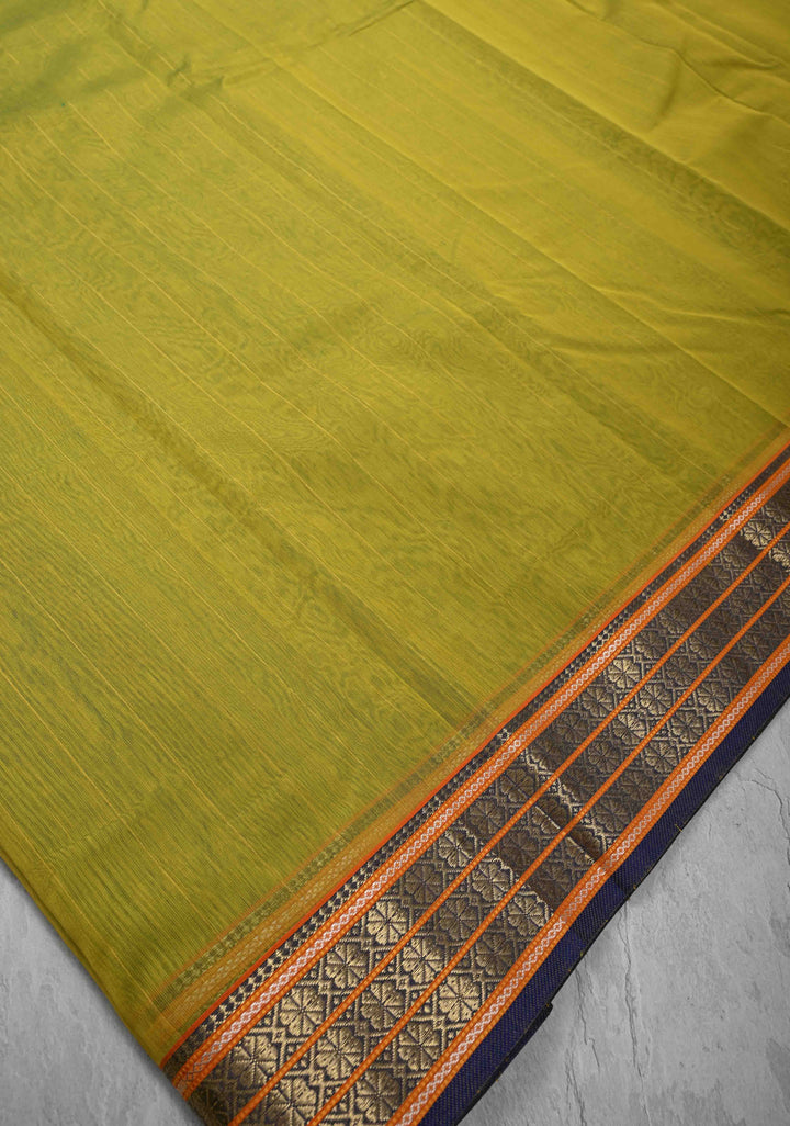 Lime Green Handwoven Maheshwari Silk Cotton Saree with Muted Stripes and Zari Borders