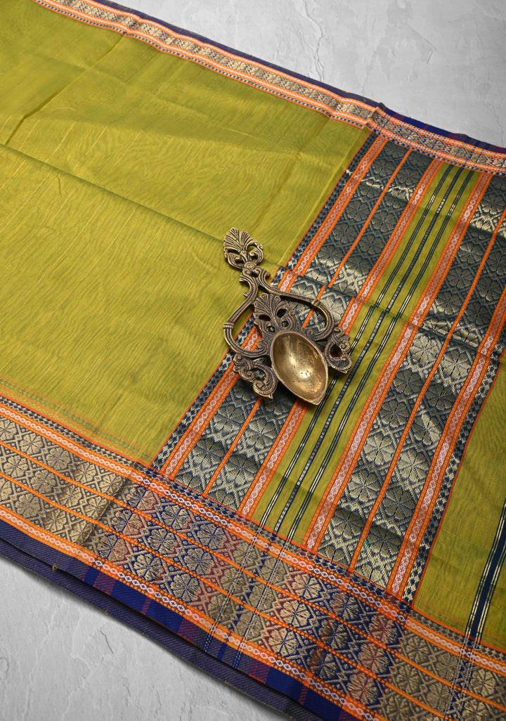 Lime Green Handwoven Maheshwari Silk Cotton Saree with Muted Stripes and Zari Borders