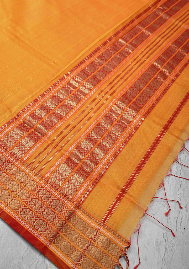 Mustard Yellow Handwoven Maheshwari Silk Cotton Saree with Muted Stripes and Zari Borders