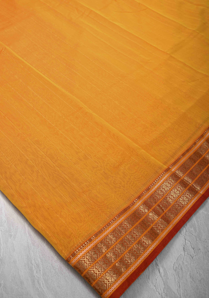 Mustard Yellow Handwoven Maheshwari Silk Cotton Saree with Muted Stripes and Zari Borders