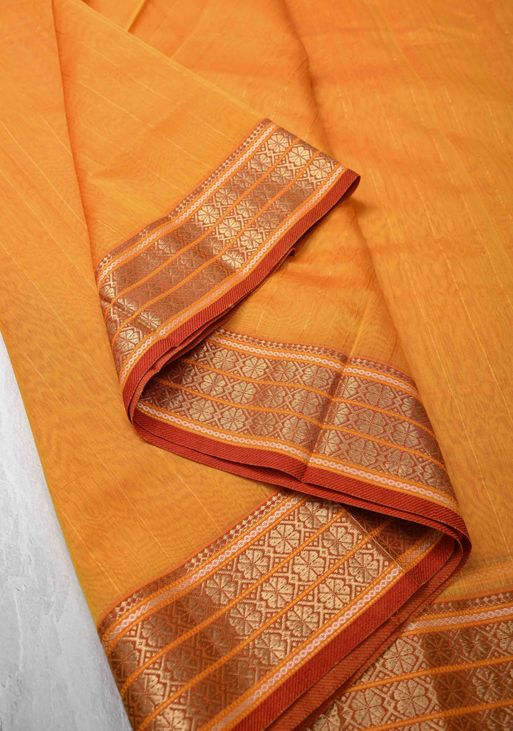 Mustard Yellow Handwoven Maheshwari Silk Cotton Saree with Muted Stripes and Zari Borders