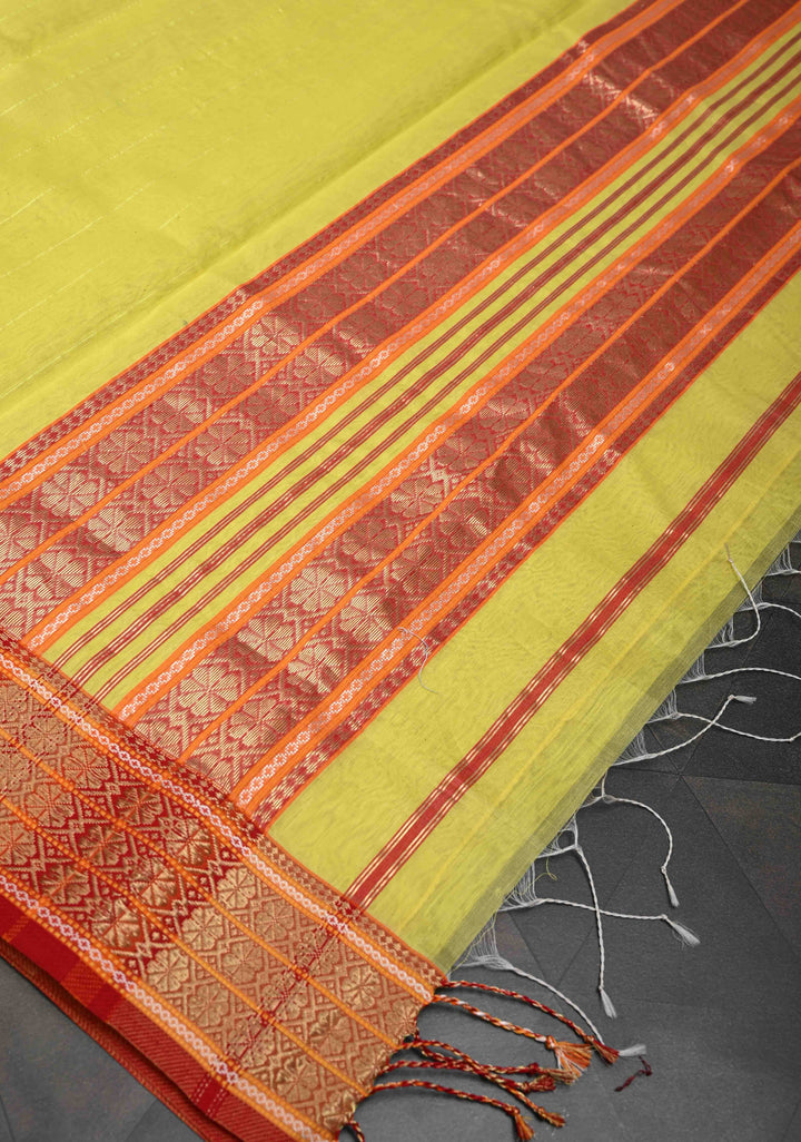 Yellow Handwoven Maheshwari Silk Cotton Saree with Muted Stripes and Zari Border
