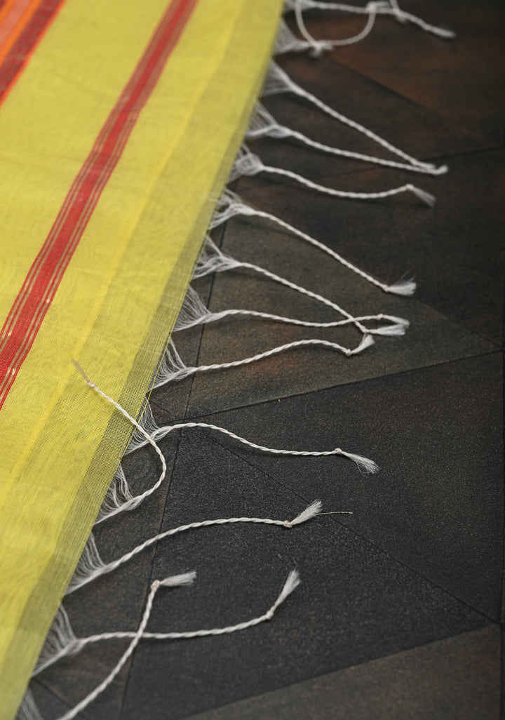 Yellow Handwoven Maheshwari Silk Cotton Saree with Muted Stripes and Zari Border