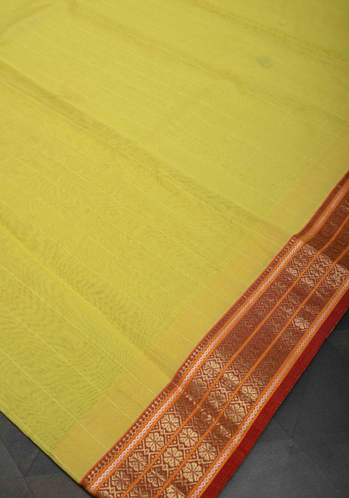 Yellow Handwoven Maheshwari Silk Cotton Saree with Muted Stripes and Zari Border