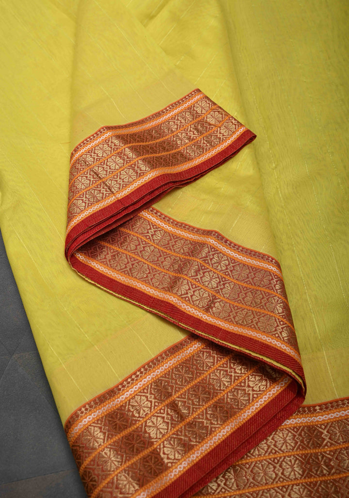 Yellow Handwoven Maheshwari Silk Cotton Saree with Muted Stripes and Zari Border