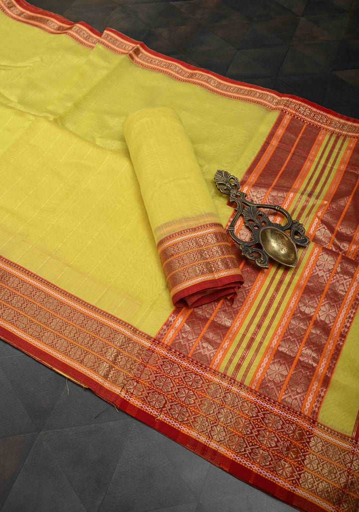 Yellow Handwoven Maheshwari Silk Cotton Saree with Muted Stripes and Zari Border