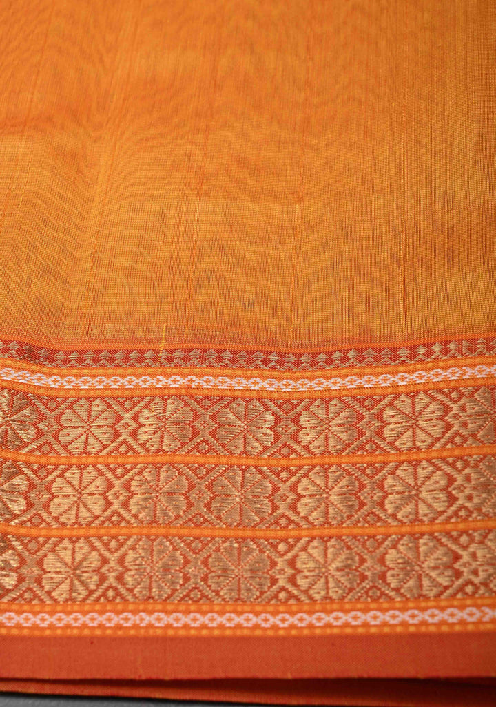 Mustard Yellow Handwoven Maheshwari Silk Cotton Saree with Muted Stripes and Zari Borders