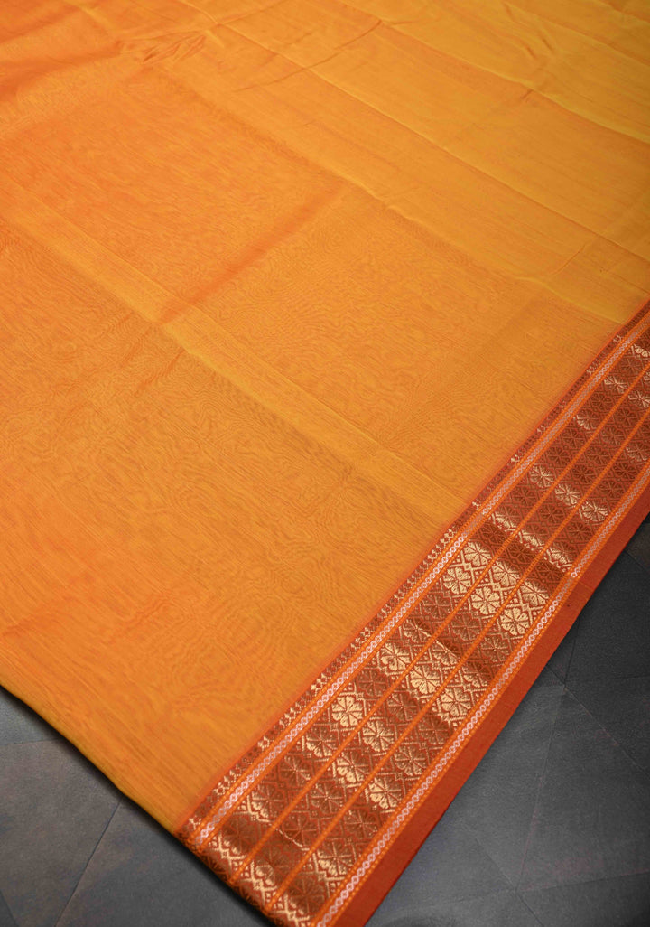 Mustard Yellow Handwoven Maheshwari Silk Cotton Saree with Muted Stripes and Zari Borders