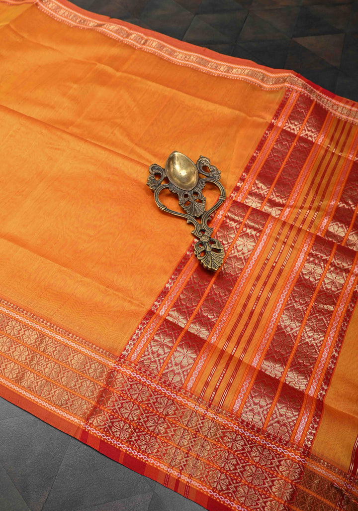 Mustard Yellow Handwoven Maheshwari Silk Cotton Saree with Muted Stripes and Zari Borders