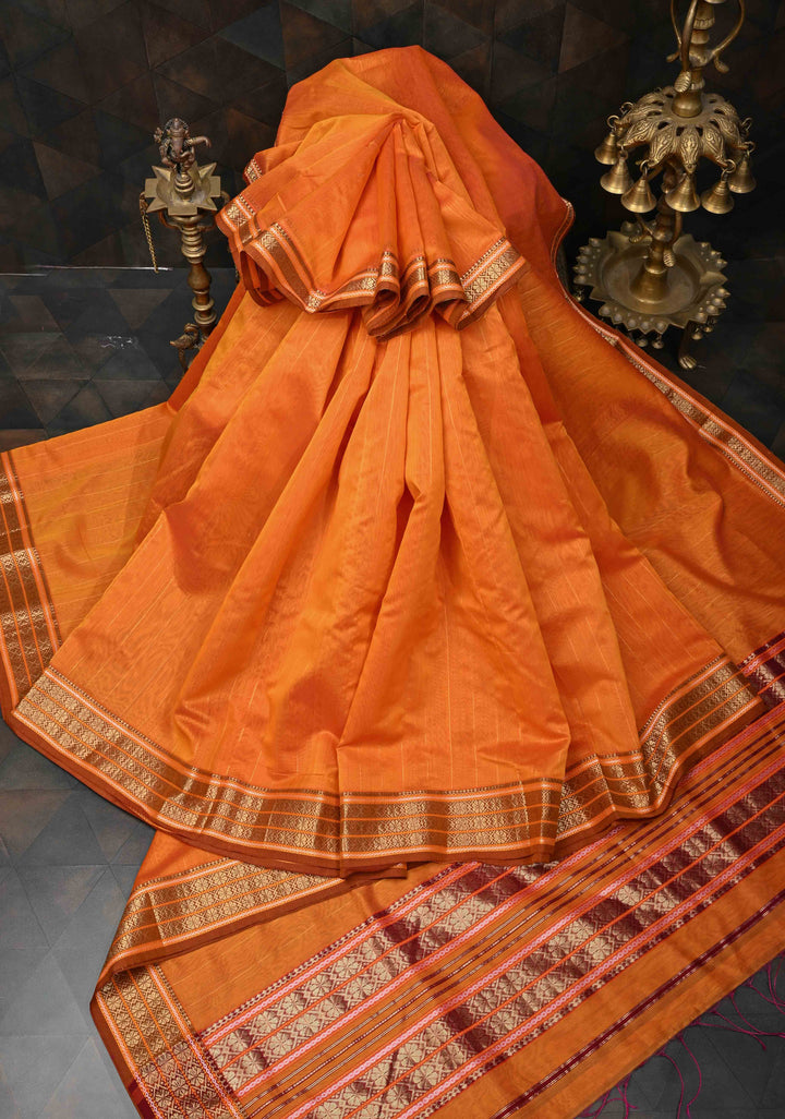 Orange Handwoven Maheshwari Silk Cotton Saree with Muted Stripes and Zari Borders